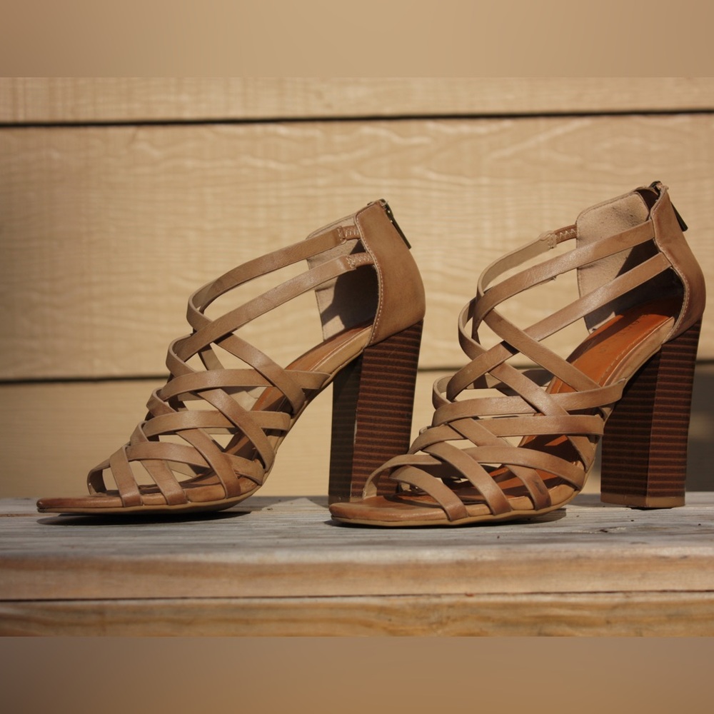 Tan shoes with brown heels.